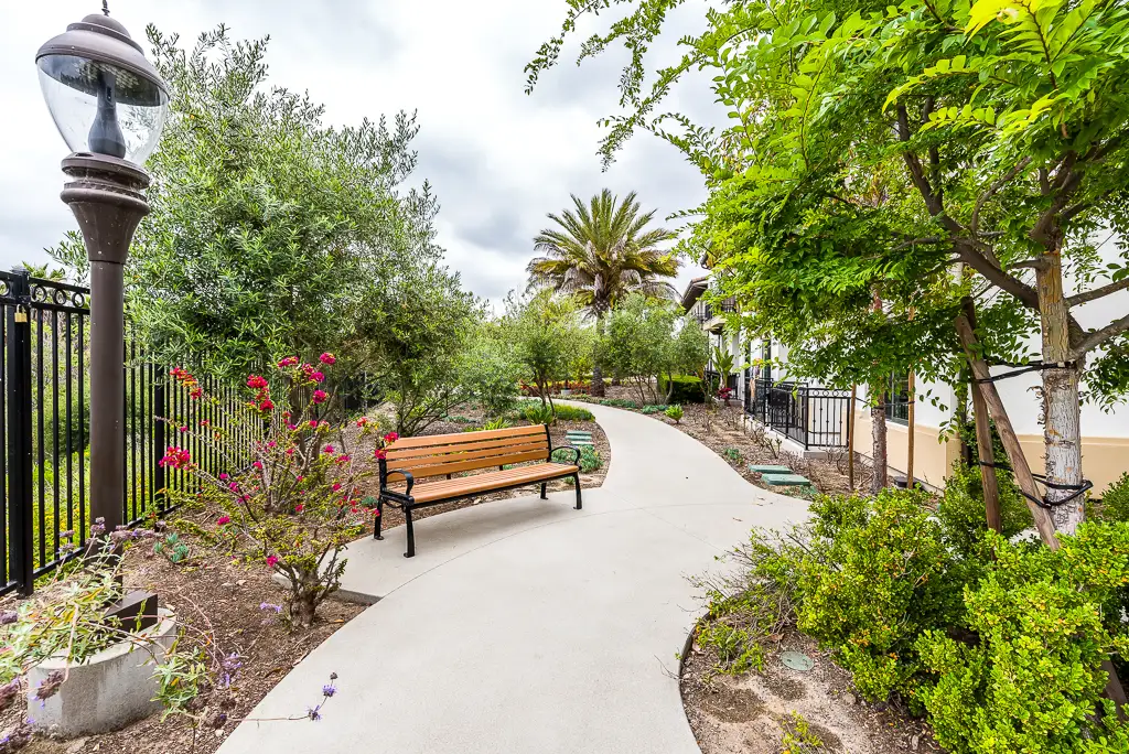 Walking Path with Gardens and Park Bench Walking Path with Gardens and Park Bench
